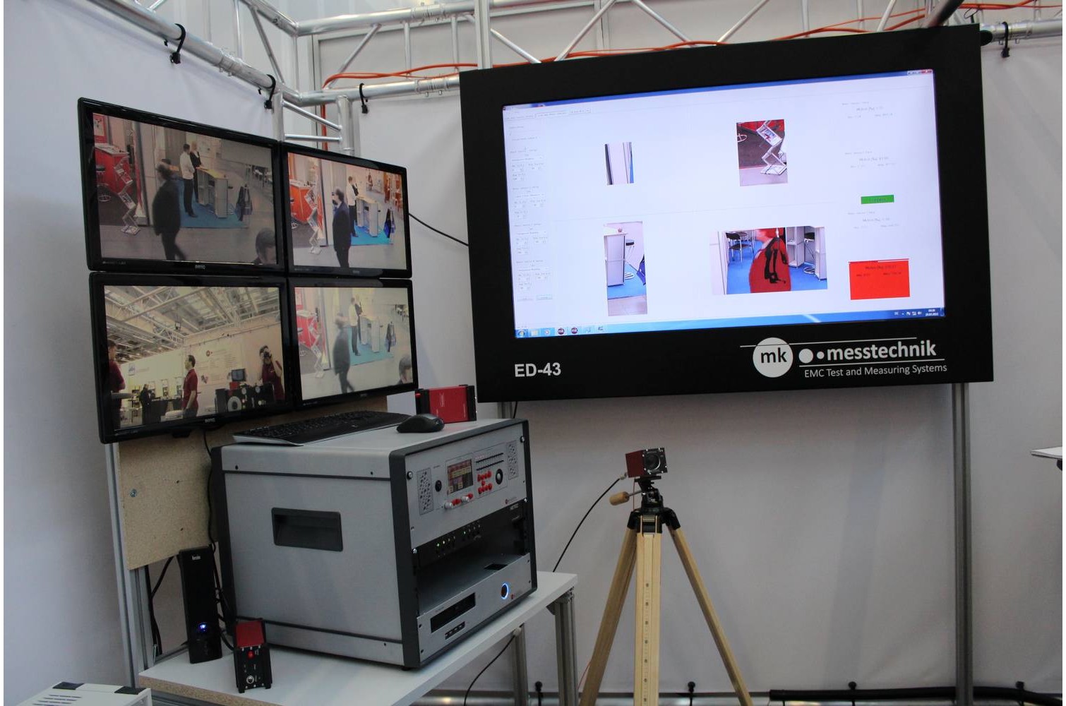 Switch matrix to the left and motion detection software running on the large screen